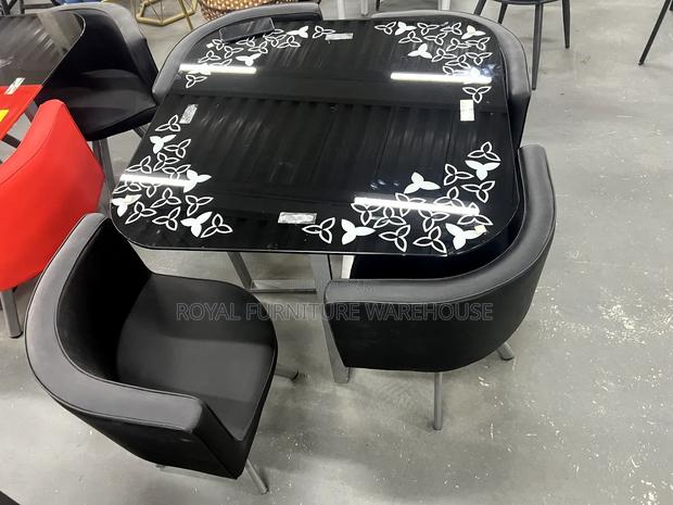 Top Finish Tempered Glass Dining Set · Photo 2
