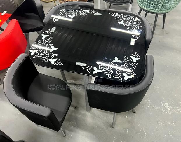 Top Finish Tempered Glass Dining Set · Photo 1