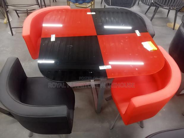 Red and Black Design Finish Tempered Glass Dining Set · Photo 1