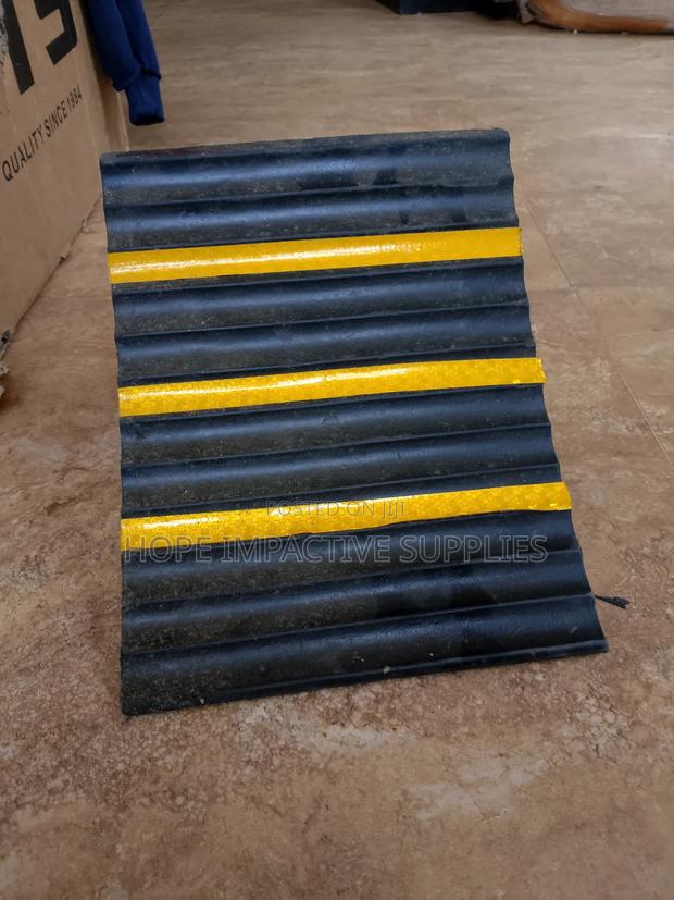 Heavy Duty Wheel Chock - Black. · Photo 1