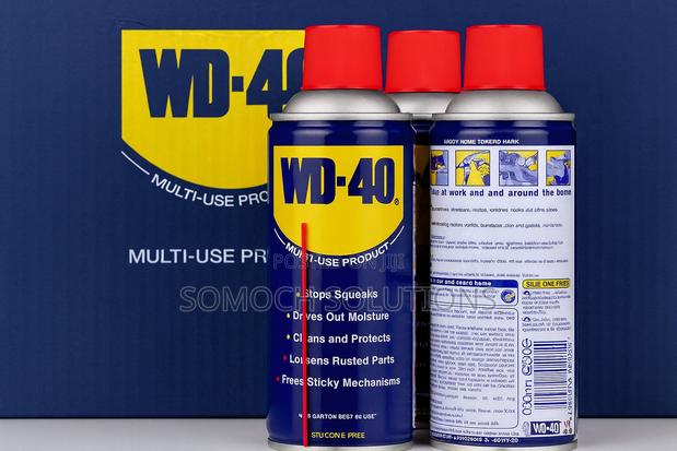 Wd-40 Multi-Use Lubricant Spray Loosens Rust, Protects Cleans 330ml · Photo 1