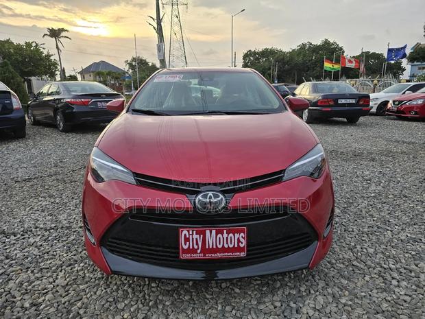 Toyota Corolla LE (1.8L 4cyl 2A) 2018 Burgundy · Photo 1