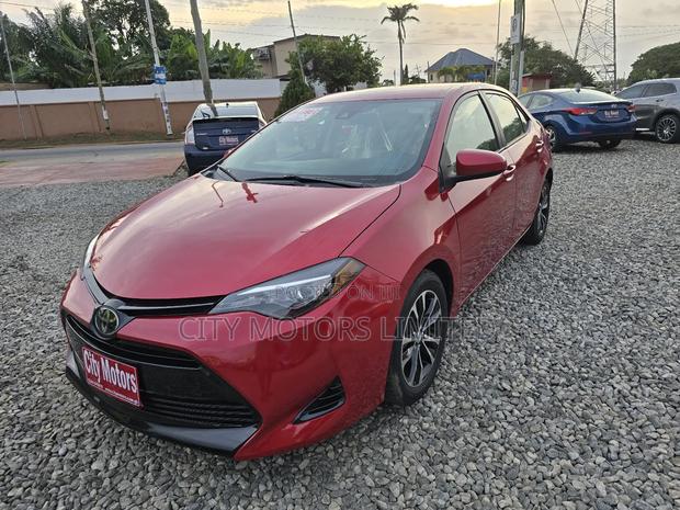 Toyota Corolla LE (1.8L 4cyl 2A) 2018 Burgundy · Photo 2