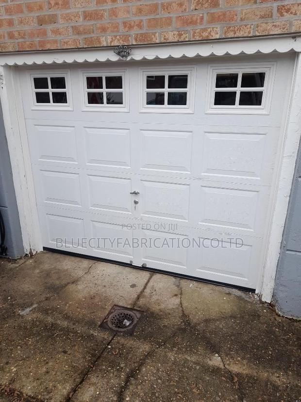 Garage Door Sale Repair and Installation · Photo 2