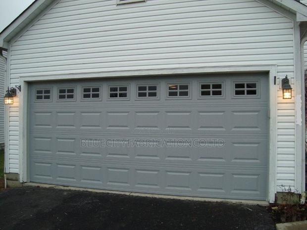 Double Garage Door Sales, Repair and Installation · Photo 1