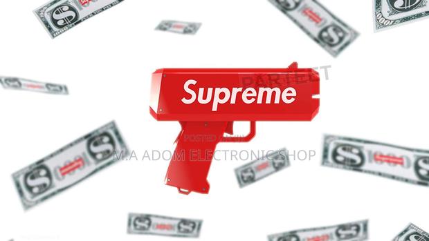 Supreme Toy Money Gun · Photo 1