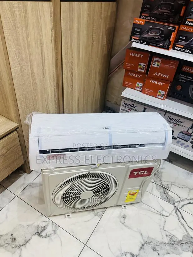 Grab the New White TCL 1.5hp Inverter Auto Restart · Photo 1