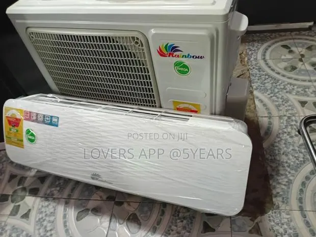 1.5hp Rainbow Elite White Ac- Window Cooling Expert. · Photo 1