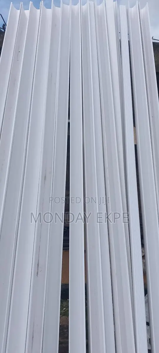 White PVC Rain Gutter and Accessories · Photo 1