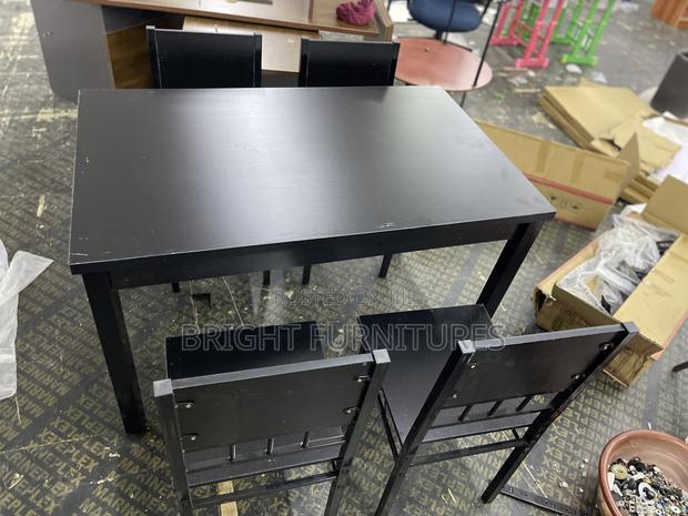 Table With 4 Seats ( Wooden and Black in Color) · Photo 4