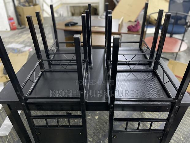 Table With 4 Seats ( Wooden and Black in Color) · Photo 5