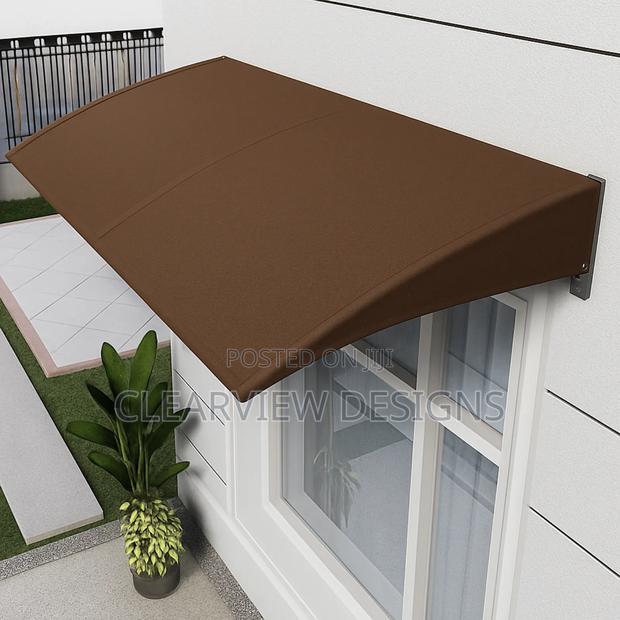 Durable Window Door Awnings – Custom Fabrication · Photo 1