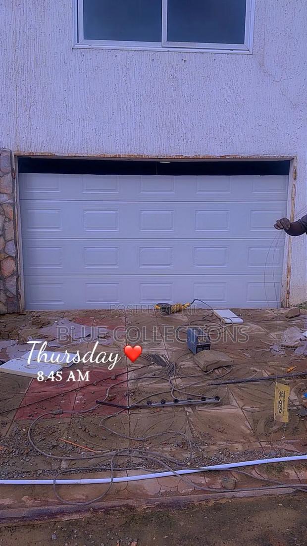 Automated Garage Door With Solar Power · Photo 1