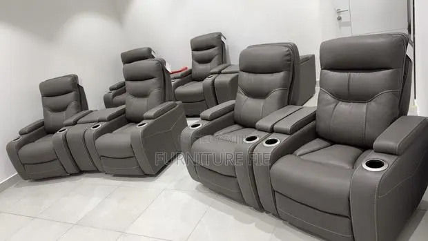 Jabarr 7-Pc. Beyond Leather Theater Seating With 3 Consoles · Photo 1
