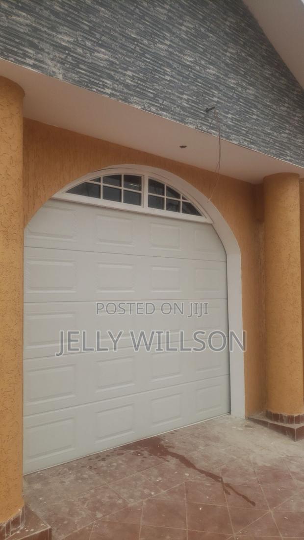 11 X 8 Garage Doors M · Photo 1
