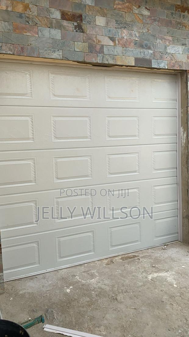 Garage Door 14 X 8 Feet · Photo 1
