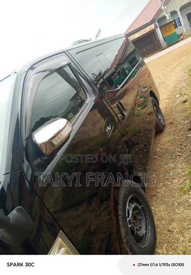 Nissan Caravan (Urvan) 2013 Black · Photo 2