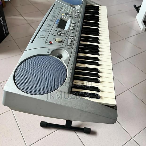 PSR 275_ 61 Keys_ Keyboard_ Piano · Photo 1