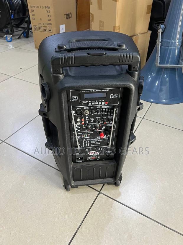 GLS 12 Inches Bluetooth Speaker With Two Microphone and a Stand · Photo 2