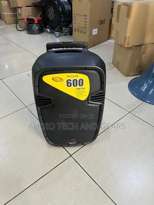 GLS 12 Inches Bluetooth Speaker With Two Microphone and a Stand · Photo 1