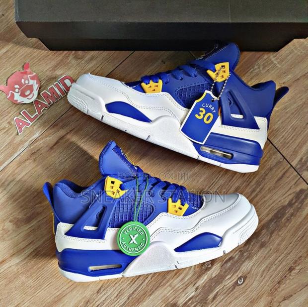 Air Jordan Retro 4 Curry Blue/White · Photo 1
