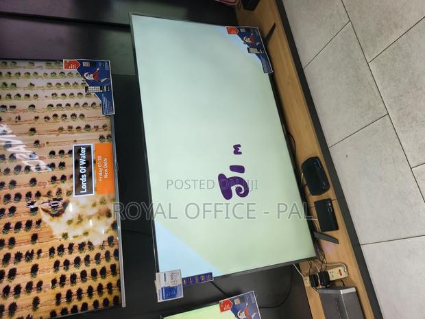 Nasco Fresh 65 Inches Uhd Smart Slim Vidaa Television · Photo 1