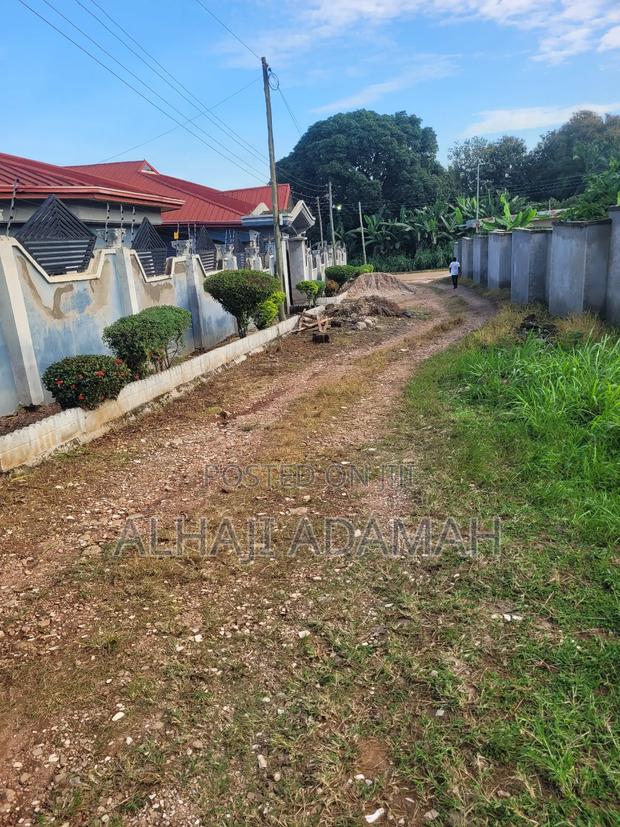 One Acre of Land for Sale Between Santasi and Apire Main Road · Photo 1