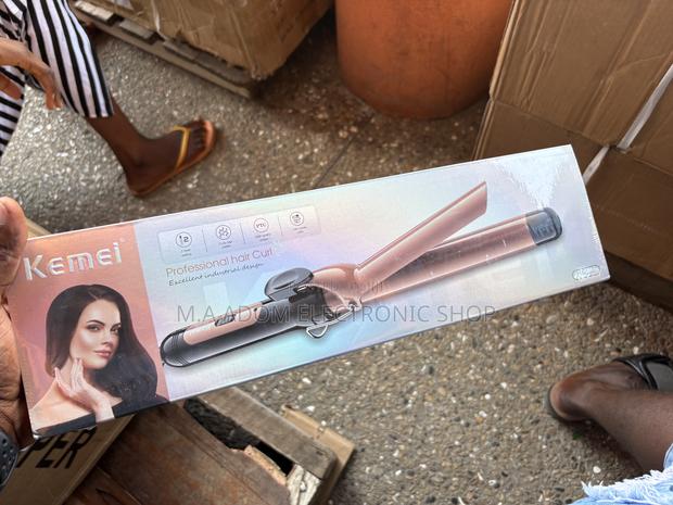 Kemei Professional Hair Curler · Photo 1