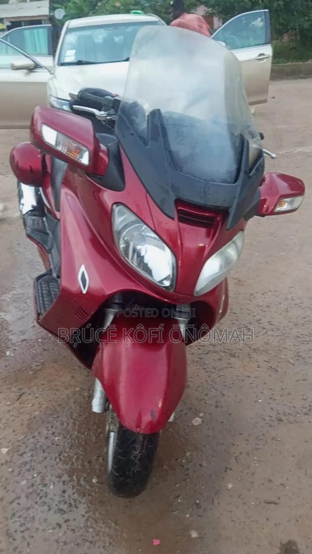 Suzuki Burgman 2010 Red · Photo 1