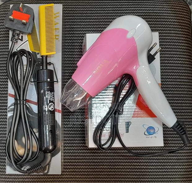 Hot Comb and Pink Hair Dryer · Photo 1