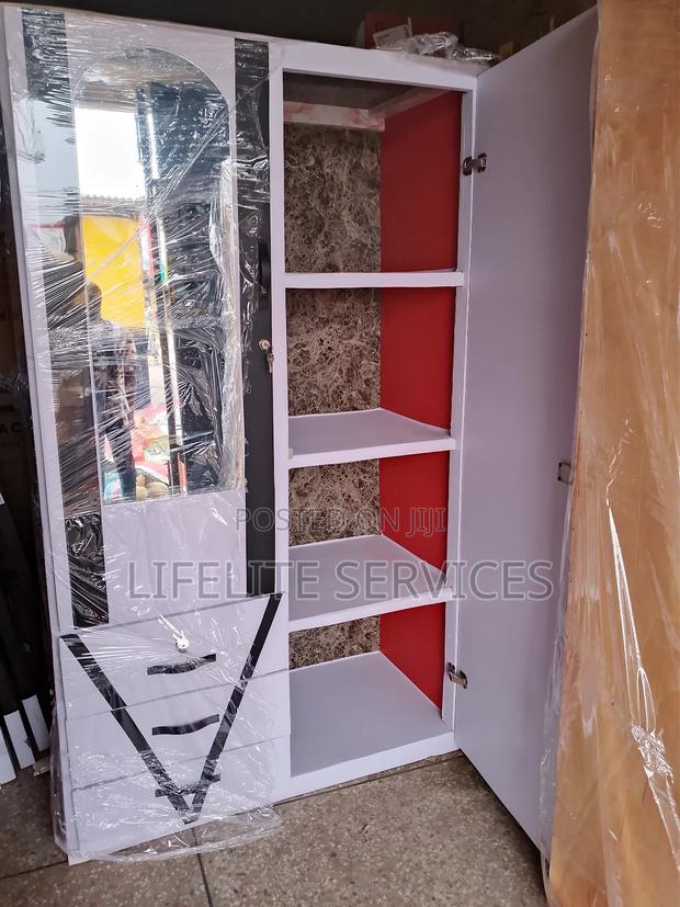 Modern Treated-Wood Wardrobe With Dressing Mirror Drawers · Photo 1