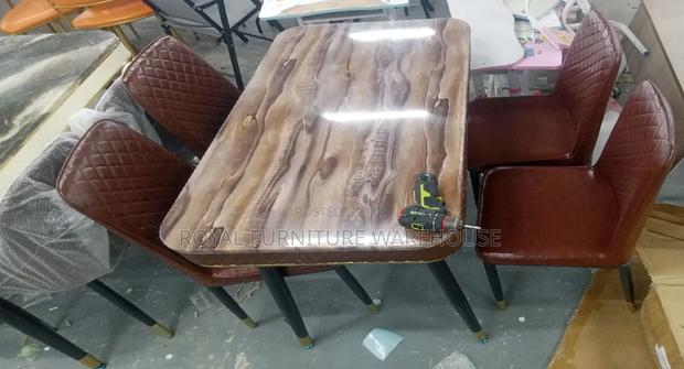 Imported 4 Seater Dining Set With Heavy Marble Top · Photo 2