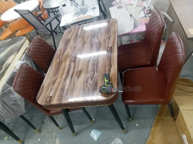 Imported 4 Seater Dining Set With Heavy Marble Top · Photo 1