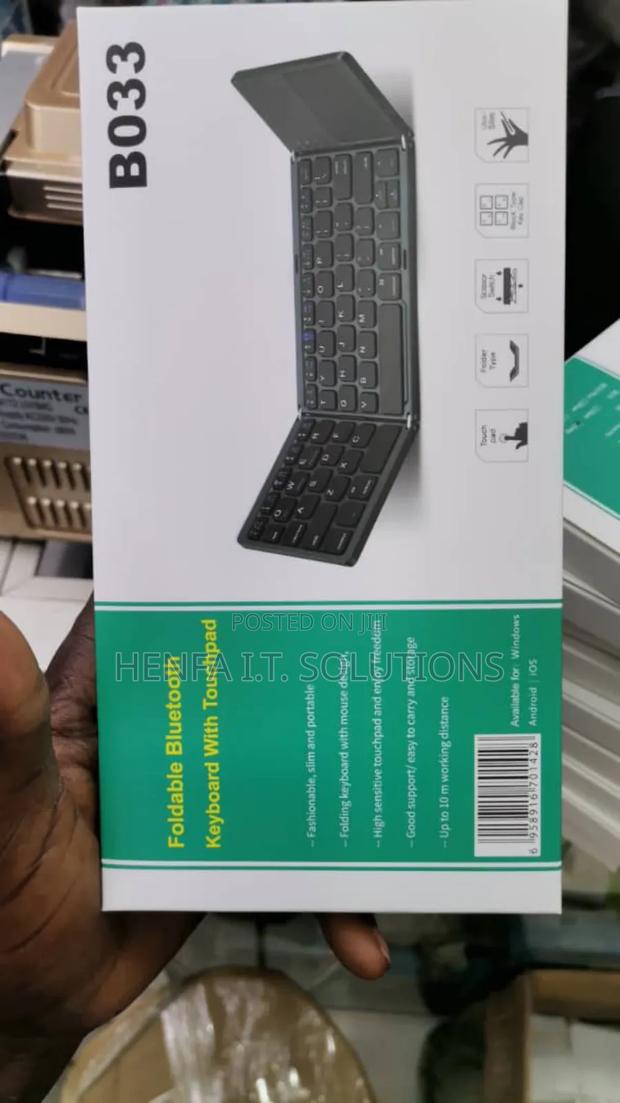 Foldable Bluetooth Keyboard With a Touchpad · Photo 1