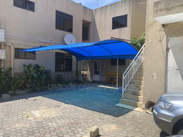 Traditional Color Blue Carport · Photo 1