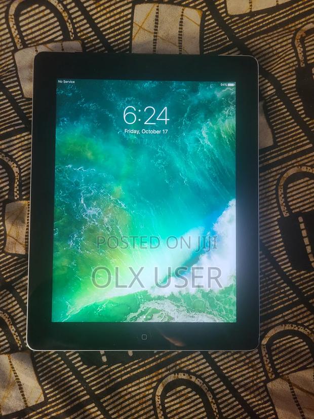 Apple iPad 4 Wi-Fi + Cellular 128 GB Silver · Photo 1