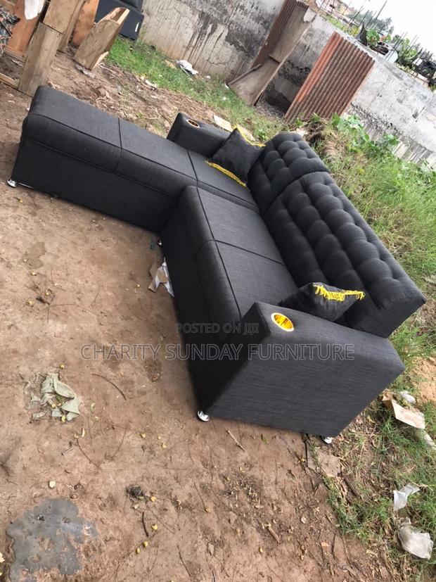 L Shape Sofa With Pillows · Photo 2