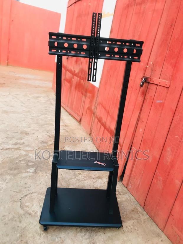 Professional Mobile Tv Stand With Dual Shelves · Photo 1