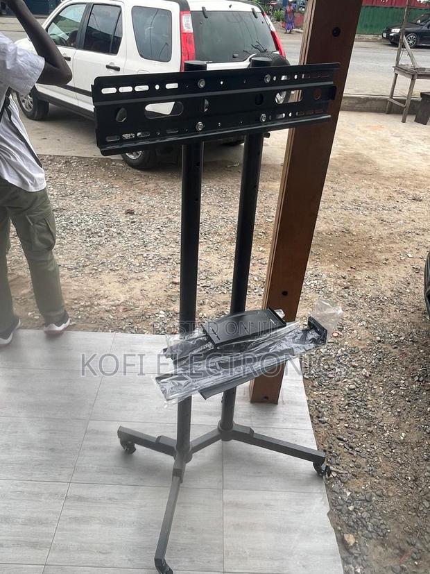 Adjustable 32–70 Inch Mobile Tv Stand With Wheels · Photo 1