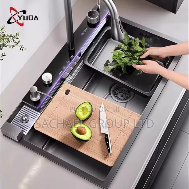 Kitchen Sink With Water Fall Functionality · Photo 1