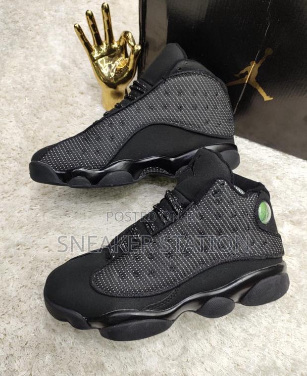 Air Jordan Retro 13 All Black · Photo 1
