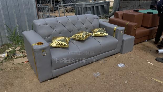 Ash Leather Sofa With Golden Pilos · Photo 2