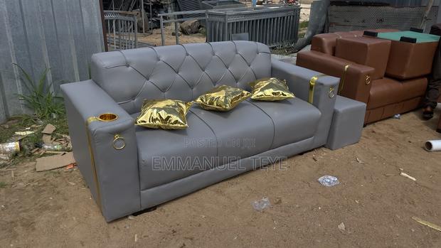 Ash Leather Sofa With Golden Pilos · Photo 1