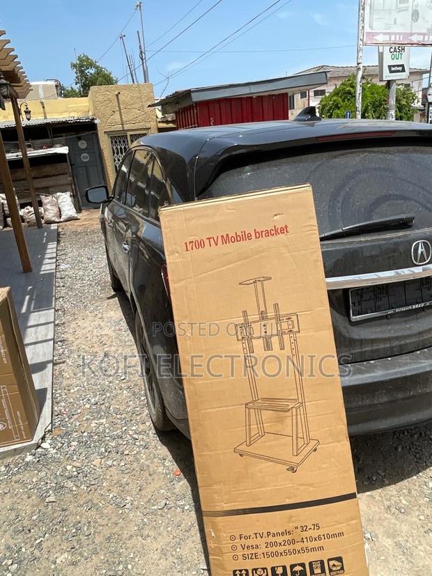 Universal Mobile Tv Cart With Double Shelves 32-75” · Photo 1