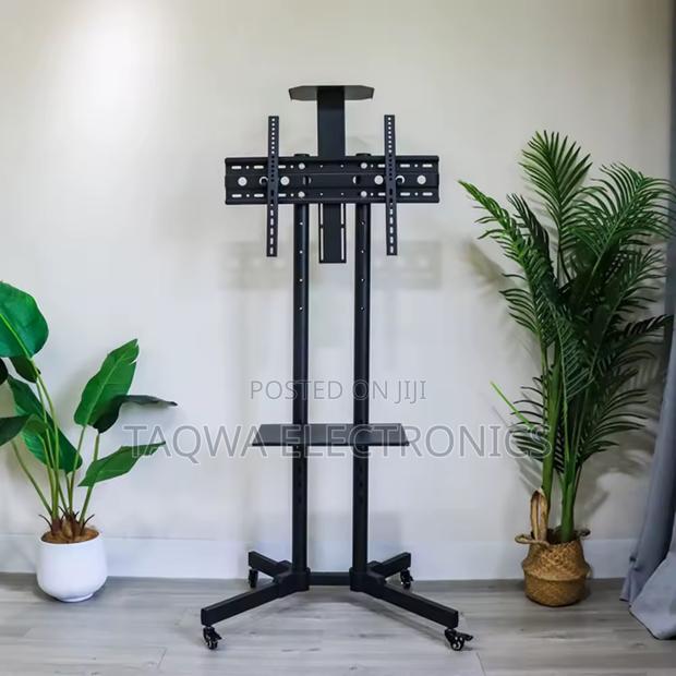 Brand New 32-70 Inch Tv Stand · Photo 1