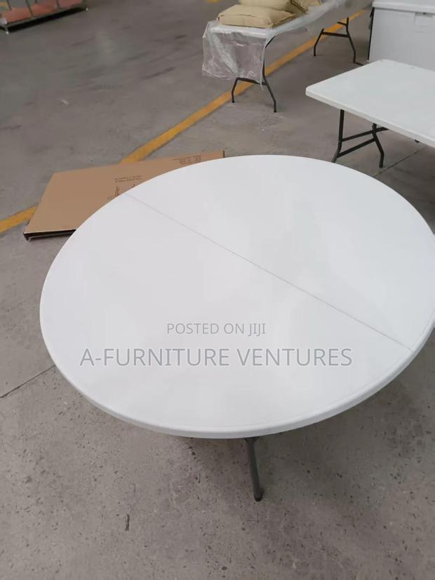 Round 10 Seater Table · Photo 1