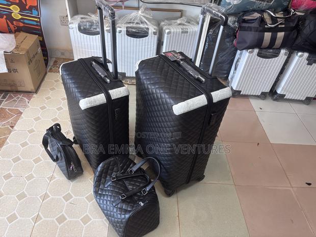 4-in-1 Quilted Leather Travel Luggage Set (Black) · Photo 2
