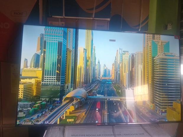 Happy Vibes With TCL Digital Uhd TCL Tv · Photo 1