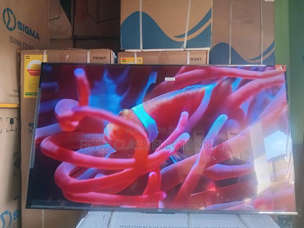 Banker TCL Digital Uhd TCL Tv · Photo 1