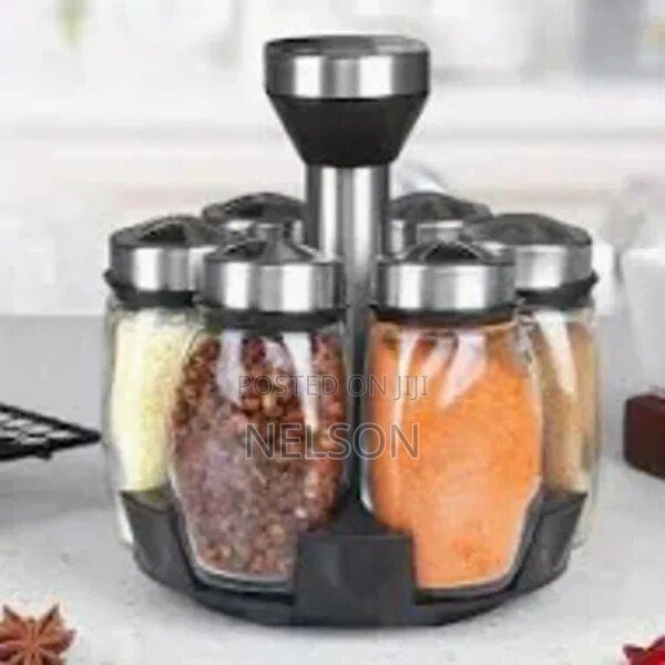 Rotating Spice Rack With Glass Jars. · Photo 1
